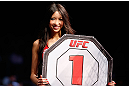 SAITAMA, JAPAN - MARCH 03:  UFC Octagon Girl Azusa Nishigaki introduces a round during the UFC on FUEL TV event at Saitama Super Arena on March 3, 2013 in Saitama, Japan.  (Photo by Josh Hedges/Zuffa LLC/Zuffa LLC via Getty Images)