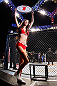 SAITAMA, JAPAN - MARCH 03:  UFC Octagon Girl Azusa Nishigaki introduces a rounds during the UFC on FUEL TV event at Saitama Super Arena on March 3, 2013 in Saitama, Japan.  (Photo by Josh Hedges/Zuffa LLC/Zuffa LLC via Getty Images)