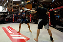 MONTREAL, QC - MARCH 13:  Carlos Condit (L) conducts an open training session for fans and media ahead of his UFC 158 bout at Complexe Desjardins on March 13, 2013 in Montreal, Quebec, Canada.  (Photo by Josh Hedges/Zuffa LLC/Zuffa LLC via Getty Images)