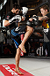 MONTREAL, QC - MARCH 13:  Carlos Condit (L) conducts an open training session for fans and media ahead of his UFC 158 bout at Complexe Desjardins on March 13, 2013 in Montreal, Quebec, Canada.  (Photo by Josh Hedges/Zuffa LLC/Zuffa LLC via Getty Images)