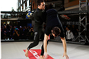 MONTREAL, QC - MARCH 13:  Jake Ellenberger (L) conducts an open training session for fans and media ahead of his UFC 158 bout at Complexe Desjardins on March 13, 2013 in Montreal, Quebec, Canada.  (Photo by Josh Hedges/Zuffa LLC/Zuffa LLC via Getty Images)