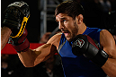 MONTREAL, QC - MARCH 13:  Patrick Cote conducts an open training session for fans and media ahead of his UFC 158 bout at Complexe Desjardins on March 13, 2013 in Montreal, Quebec, Canada.  (Photo by Josh Hedges/Zuffa LLC/Zuffa LLC via Getty Images)