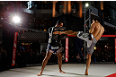 MONTREAL, QC - MARCH 13:  Patrick Cote (R) conducts an open training session for fans and media ahead of his UFC 158 bout at Complexe Desjardins on March 13, 2013 in Montreal, Quebec, Canada.  (Photo by Josh Hedges/Zuffa LLC/Zuffa LLC via Getty Images)