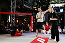 MONTREAL, QC - MARCH 13:  UFC welterweight champion Georges St-Pierre (L) spars with students of the Sunfuki Karate school during the UFC 158 open workouts at Complexe Desjardins on March 13, 2013 in Montreal, Quebec, Canada.  (Photo by Josh Hedges/Zuffa LLC/Zuffa LLC via Getty Images)
