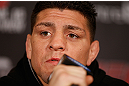 MONTREAL, QC - MARCH 14:  Nick Diaz interacts with media during the final press conference ahead of his UFC 158 bout at Bell Centre on March 14, 2013 in Montreal, Quebec, Canada.  (Photo by Josh Hedges/Zuffa LLC/Zuffa LLC via Getty Images)