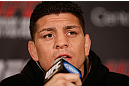 MONTREAL, QC - MARCH 14:  Nick Diaz interacts with media during the final press conference ahead of his UFC 158 bout at Bell Centre on March 14, 2013 in Montreal, Quebec, Canada.  (Photo by Josh Hedges/Zuffa LLC/Zuffa LLC via Getty Images)