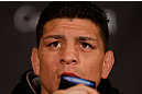 MONTREAL, QC - MARCH 14:  Nick Diaz interacts with media during the final press conference ahead of his UFC 158 bout at Bell Centre on March 14, 2013 in Montreal, Quebec, Canada.  (Photo by Josh Hedges/Zuffa LLC/Zuffa LLC via Getty Images)