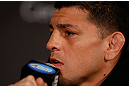 MONTREAL, QC - MARCH 14:  Nick Diaz interacts with media during the final press conference ahead of his UFC 158 bout at Bell Centre on March 14, 2013 in Montreal, Quebec, Canada.  (Photo by Josh Hedges/Zuffa LLC/Zuffa LLC via Getty Images)