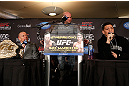 MONTREAL, QC - MARCH 14:  Nick Diaz (R) and Georges St-Pierre (L) argue with each other during the final press conference ahead of his UFC 158 bout at Bell Centre on March 14, 2013 in Montreal, Quebec, Canada.  (Photo by Josh Hedges/Zuffa LLC/Zuffa LLC via Getty Images)