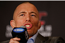 MONTREAL, QC - MARCH 14:  Georges St-Pierre interacts with media during the final press conference ahead of his UFC 158 bout at Bell Centre on March 14, 2013 in Montreal, Quebec, Canada.  (Photo by Josh Hedges/Zuffa LLC/Zuffa LLC via Getty Images)