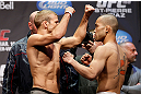 MONTREAL, QC - MARCH 15: (L-R) T.J. Dillashaw faces off with Issei Tamura during the UFC 158 weigh-in at Bell Centre on March 15, 2013 in Montreal, Quebec, Canada.  (Photo by Josh Hedges/Zuffa LLC/Zuffa LLC via Getty Images)