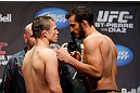 MONTREAL, QC - MARCH 15:  (L-R) Rick Story and Quinn Mulhern face off during the UFC 158 weigh-in at Bell Centre on March 15, 2013 in Montreal, Quebec, Canada.  (Photo by Josh Hedges/Zuffa LLC/Zuffa LLC via Getty Images)