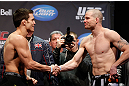 MONTREAL, QC - MARCH 15: Nate Marquardt and Jake Ellenberger displaying sportsmanship during the UFC 158 weigh-in at Bell Centre on March 15, 2013 in Montreal, Quebec, Canada.  (Photo by Josh Hedges/Zuffa LLC/Zuffa LLC via Getty Images)