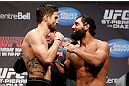 MONTREAL, QC - MARCH 15: Carlos Condit and Johny Hendricks face off during the UFC 158 weigh-in at Bell Centre on March 15, 2013 in Montreal, Quebec, Canada.  (Photo by Josh Hedges/Zuffa LLC/Zuffa LLC via Getty Images)