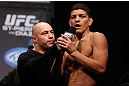 MONTREAL, QC - MARCH 15:  Nick Diaz speaks with Joe Rogan during the UFC 158 weigh-in at Bell Centre on March 15, 2013 in Montreal, Quebec, Canada.  (Photo by Josh Hedges/Zuffa LLC/Zuffa LLC via Getty Images)
