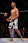 MONTREAL, QC - MARCH 16: T.J. Dillashaw reacts after defeating Issei Tamura in their bantamweight bout during the UFC 158 event at Bell Centre on March 16, 2013 in Montreal, Quebec, Canada.  (Photo by Jonathan Ferrey/Zuffa LLC/Zuffa LLC via Getty Images)