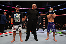 MONTREAL, QC - MARCH 16:  Issei Tamura reacts to defeat against T.J. Dillashaw in their bantamweight bout during the UFC 158 event at Bell Centre on March 16, 2013 in Montreal, Quebec, Canada.  (Photo by Jonathan Ferrey/Zuffa LLC/Zuffa LLC via Getty Images)