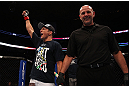 MONTREAL, QC - MARCH 16: T.J. Dillashaw celebrates his win over Issei Tamura in their bantamweight bout during the UFC 158 event at Bell Centre on March 16, 2013 in Montreal, Quebec, Canada.  (Photo by Jonathan Ferrey/Zuffa LLC/Zuffa LLC via Getty Images)
