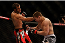 MONTREAL, QC - MARCH 16: (L-R) Quinn Mulhern lands a punch against Quinn Mulhern in their welterweight bout during the UFC 158 event at Bell Centre on March 16, 2013 in Montreal, Quebec, Canada.  (Photo by Jonathan Ferrey/Zuffa LLC/Zuffa LLC via Getty Images)