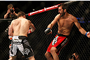 MONTREAL, QC - MARCH 16: (L-R) Rick Story punches Quinn Mulhern in their welterweight bout during the UFC 158 event at Bell Centre on March 16, 2013 in Montreal, Quebec, Canada.  (Photo by Jonathan Ferrey/Zuffa LLC/Zuffa LLC via Getty Images)