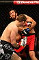 MONTREAL, QC - MARCH 16: Rick Story throws a punch to the face of Quinn Mulhern in their welterweight bout during the UFC 158 event at Bell Centre on March 16, 2013 in Montreal, Quebec, Canada.  (Photo by Jonathan Ferrey/Zuffa LLC/Zuffa LLC via Getty Images)