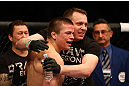 MONTREAL, QC - MARCH 16: Rick Story celebrates with his corner after defeating Quinn Mulhern in their welterweight bout during the UFC 158 event at Bell Centre on March 16, 2013 in Montreal, Quebec, Canada.  (Photo by Jonathan Ferrey/Zuffa LLC/Zuffa LLC via Getty Images)