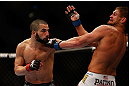 MONTREAL, QC - MARCH 16: John Makdessi punches Daron Cruickshank in their lightweight bout during the UFC 158 event at Bell Centre on March 16, 2013 in Montreal, Quebec, Canada.  (Photo by Jonathan Ferrey/Zuffa LLC/Zuffa LLC via Getty Images)