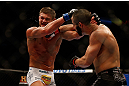 MONTREAL, QC - MARCH 16: John Makdessi punches Daron Cruickshank in their lightweight bout during the UFC 158 event at Bell Centre on March 16, 2013 in Montreal, Quebec, Canada.  (Photo by Jonathan Ferrey/Zuffa LLC/Zuffa LLC via Getty Images)