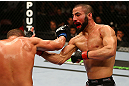 MONTREAL, QC - MARCH 16: John Makdessi punches Daron Cruickshank in their lightweight bout during the UFC 158 event at Bell Centre on March 16, 2013 in Montreal, Quebec, Canada.  (Photo by Jonathan Ferrey/Zuffa LLC/Zuffa LLC via Getty Images)