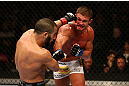 MONTREAL, QC - MARCH 16: Daron Cruickshank lands a punch on John Makdessi in their lightweight bout during the UFC 158 event at Bell Centre on March 16, 2013 in Montreal, Quebec, Canada.  (Photo by Jonathan Ferrey/Zuffa LLC/Zuffa LLC via Getty Images)