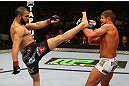 MONTREAL, QC - MARCH 16: John Makdessi lands a kick against Daron Cruickshank in their lightweight bout during the UFC 158 event at Bell Centre on March 16, 2013 in Montreal, Quebec, Canada.  (Photo by Jonathan Ferrey/Zuffa LLC/Zuffa LLC via Getty Images)