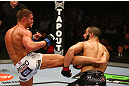 MONTREAL, QC - MARCH 16: Daron Cruickshank lands a kick against John Makdessi in their lightweight bout during the UFC 158 event at Bell Centre on March 16, 2013 in Montreal, Quebec, Canada.  (Photo by Jonathan Ferrey/Zuffa LLC/Zuffa LLC via Getty Images)