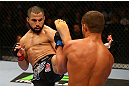 MONTREAL, QC - MARCH 16: John Makdessi lands a kick against Daron Cruickshank in their lightweight bout during the UFC 158 event at Bell Centre on March 16, 2013 in Montreal, Quebec, Canada.  (Photo by Jonathan Ferrey/Zuffa LLC/Zuffa LLC via Getty Images)