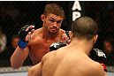 MONTREAL, QC - MARCH 16: (L-R) Daron Cruickshank fights against John Makdessi in their lightweight bout during the UFC 158 event at Bell Centre on March 16, 2013 in Montreal, Quebec, Canada.  (Photo by Jonathan Ferrey/Zuffa LLC/Zuffa LLC via Getty Images)