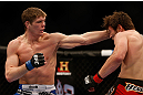 MONTREAL, QC - MARCH 16: Jordan Mein punches Dan Miller in their welterweight bout during the UFC 158 event at Bell Centre on March 16, 2013 in Montreal, Quebec, Canada.  (Photo by Josh Hedges/Zuffa LLC/Zuffa LLC via Getty Images)