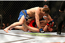 MONTREAL, QC - MARCH 16: Jordan Mein punches Dan Miller in their welterweight bout during the UFC 158 event at Bell Centre on March 16, 2013 in Montreal, Quebec, Canada.  (Photo by Josh Hedges/Zuffa LLC/Zuffa LLC via Getty Images)