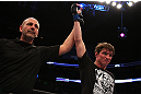 MONTREAL, QC - MARCH 16:  Referee raises Darren Elkins hand in victory over Antonio Carvalho in their featherweight bout during the UFC 158 event at Bell Centre on March 16, 2013 in Montreal, Quebec, Canada.  (Photo by Jonathan Ferrey/Zuffa LLC/Zuffa LLC via Getty Images)