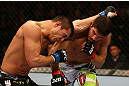 MONTREAL, QC - MARCH 16: (R-L) Patrick Cote lands a punch on Bobby Voelker in their welterweight bout during the UFC 158 event at Bell Centre on March 16, 2013 in Montreal, Quebec, Canada.  (Photo by Jonathan Ferrey/Zuffa LLC/Zuffa LLC via Getty Images)
