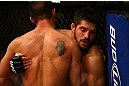 MONTREAL, QC - MARCH 16: (L-R) Patrick Cote and Bobby Voelker clinch in their welterweight bout during the UFC 158 event at Bell Centre on March 16, 2013 in Montreal, Quebec, Canada.  (Photo by Jonathan Ferrey/Zuffa LLC/Zuffa LLC via Getty Images)