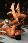 MONTREAL, QC - MARCH 16: (Bottom-Top) Patrick Cote tries to secure an arm bar on Bobby Voelkerger in their welterweight bout during the UFC 158 event at Bell Centre on March 16, 2013 in Montreal, Quebec, Canada.  (Photo by Jonathan Ferrey/Zuffa LLC/Zuffa LLC via Getty Images)