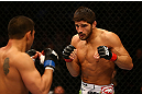 MONTREAL, QC - MARCH 16: (R-L) Patrick Cote and Bobby Voelker face each other in their welterweight bout during the UFC 158 event at Bell Centre on March 16, 2013 in Montreal, Quebec, Canada.  (Photo by Jonathan Ferrey/Zuffa LLC/Zuffa LLC via Getty Images)