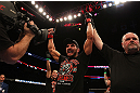 MONTREAL, QC - MARCH 16: Patrick Cote celebrates his win against Bobby Voelker in their welterweight bout during the UFC 158 event at Bell Centre on March 16, 2013 in Montreal, Quebec, Canada.  (Photo by Jonathan Ferrey/Zuffa LLC/Zuffa LLC via Getty Images)