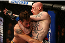 MONTREAL, QC - MARCH 16:  (L-R) Mike Ricci and Colin Fletcher clinch in their lightweight bout during the UFC 158 event at Bell Centre on March 16, 2013 in Montreal, Quebec, Canada.  (Photo by Josh Hedges/Zuffa LLC/Zuffa LLC via Getty Images)