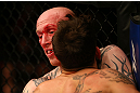 MONTREAL, QC - MARCH 16:  (Top-Bottom) Colin Fletcher and Mike Ricci grapple in their lightweight bout during the UFC 158 event at Bell Centre on March 16, 2013 in Montreal, Quebec, Canada.  (Photo by Josh Hedges/Zuffa LLC/Zuffa LLC via Getty Images)
