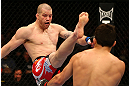 MONTREAL, QC - MARCH 16:  (L-R) Nate Marquardt kicks Jake Ellenberger in their welterweight bout during the UFC 158 event at Bell Centre on March 16, 2013 in Montreal, Quebec, Canada.  (Photo by Jonathan Ferrey/Zuffa LLC/Zuffa LLC via Getty Images)