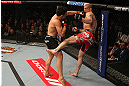 MONTREAL, QC - MARCH 16:  (L-R) Jake Ellenberger punches Nate Marquardt in their welterweight bout during the UFC 158 event at Bell Centre on March 16, 2013 in Montreal, Quebec, Canada.  (Photo by Jonathan Ferrey/Zuffa LLC/Zuffa LLC via Getty Images)