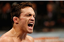 MONTREAL, QC - MARCH 16:  Jake Ellenberger reacts after knocking out Nate Marquardt in their welterweight bout during the UFC 158 event at Bell Centre on March 16, 2013 in Montreal, Quebec, Canada.  (Photo by Josh Hedges/Zuffa LLC/Zuffa LLC via Getty Images)
