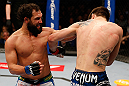 MONTREAL, QC - MARCH 16:  (L-R) Johny Hendricks punches Carlos Condit in their welterweight bout during the UFC 158 event at Bell Centre on March 16, 2013 in Montreal, Quebec, Canada.  (Photo by Josh Hedges/Zuffa LLC/Zuffa LLC via Getty Images)