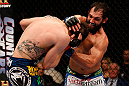 MONTREAL, QC - MARCH 16:  (R-L) Johny Hendricks punches Carlos Condit in their welterweight bout during the UFC 158 event at Bell Centre on March 16, 2013 in Montreal, Quebec, Canada.  (Photo by Josh Hedges/Zuffa LLC/Zuffa LLC via Getty Images)