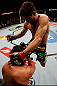 MONTREAL, QC - MARCH 16:  (R-L) Carlos Condit lands a flying knee against Johny Hendricks in their welterweight bout during the UFC 158 event at Bell Centre on March 16, 2013 in Montreal, Quebec, Canada.  (Photo by Josh Hedges/Zuffa LLC/Zuffa LLC via Getty Images)